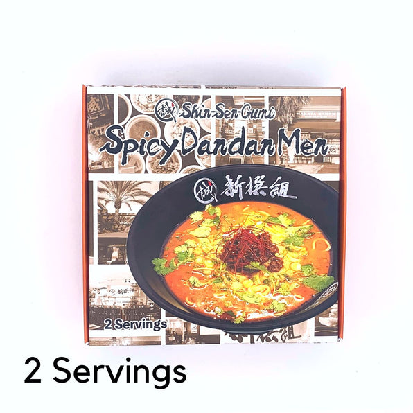 packaged spicy dan dan ramen with 2 servings text in front