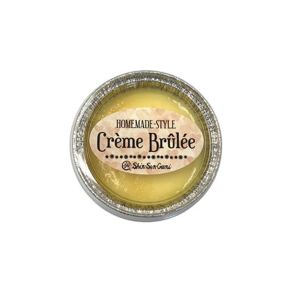 crem brulee in aluminum container with lid and sticker